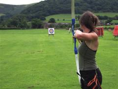 Judith doing archery.