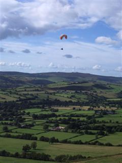 Denis flying on the Mynd.