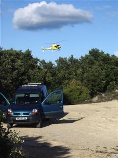 Helicopter buzzes launch.