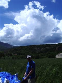 Neil packing up under a massive cloud.