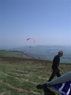 Geoff rigging, Mark L flying in the background.